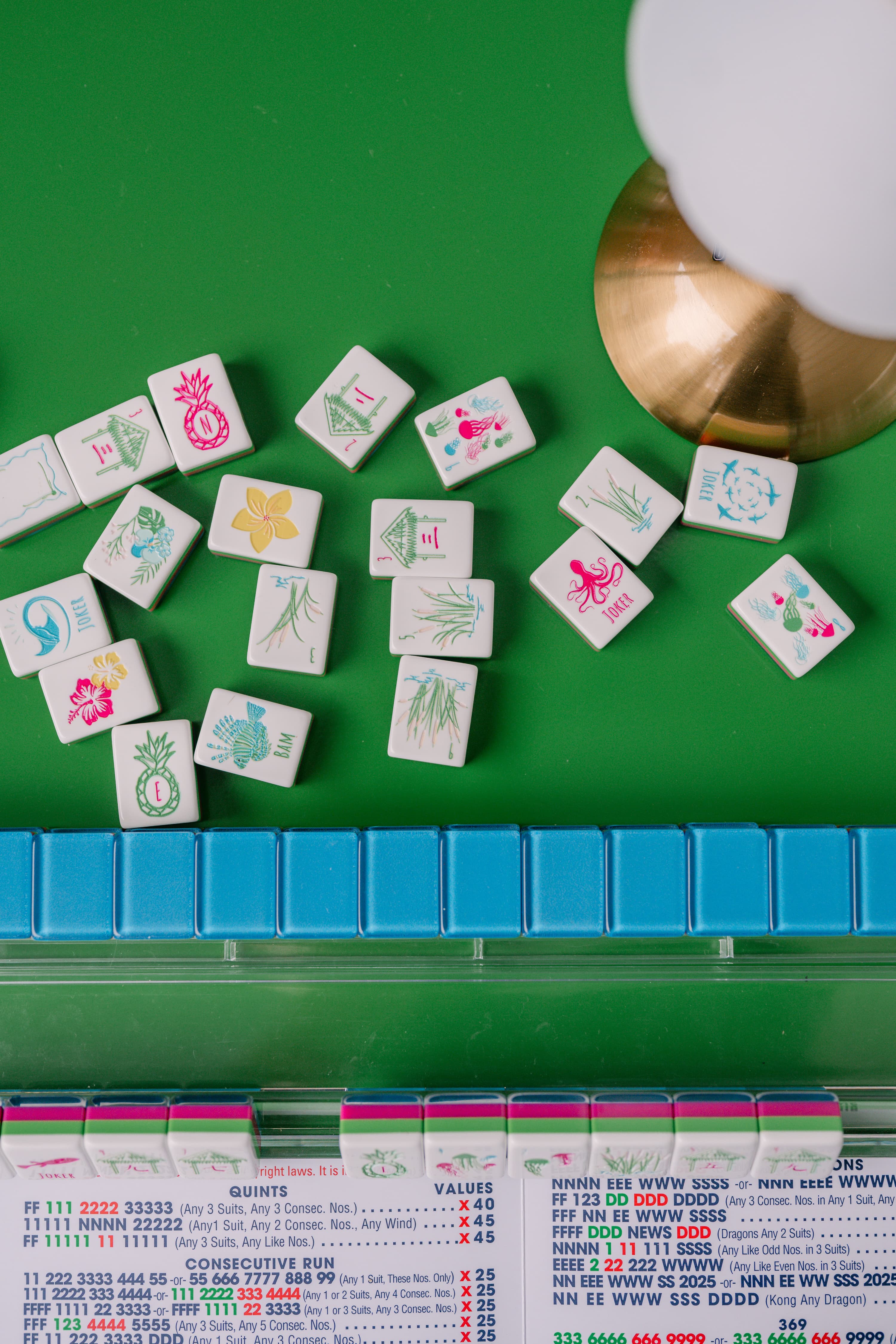 Styled Mahjong tiles with brass lamp